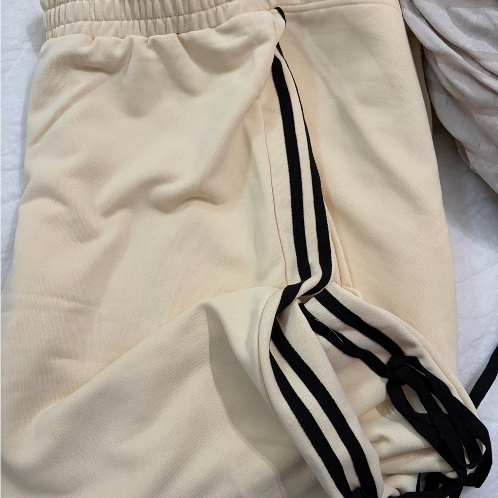 Cream sweat suit with Black bows